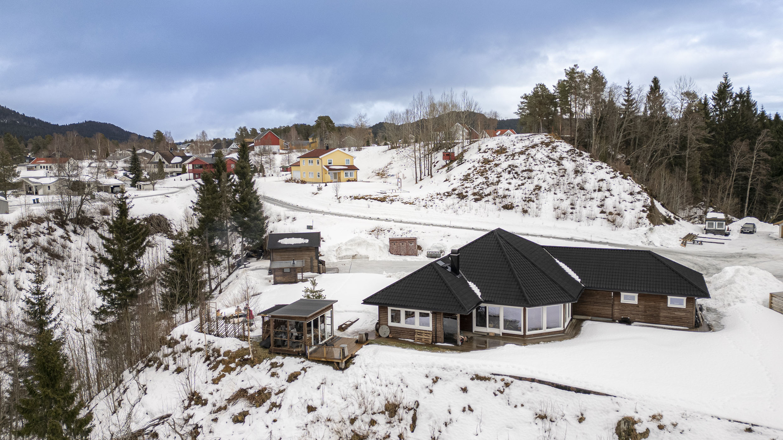 Tomt og hus i Rindal. Foto: Allsidig Design